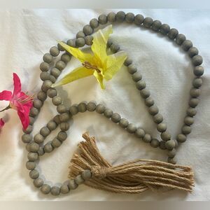 Wooden beaded garland with jute tassel!